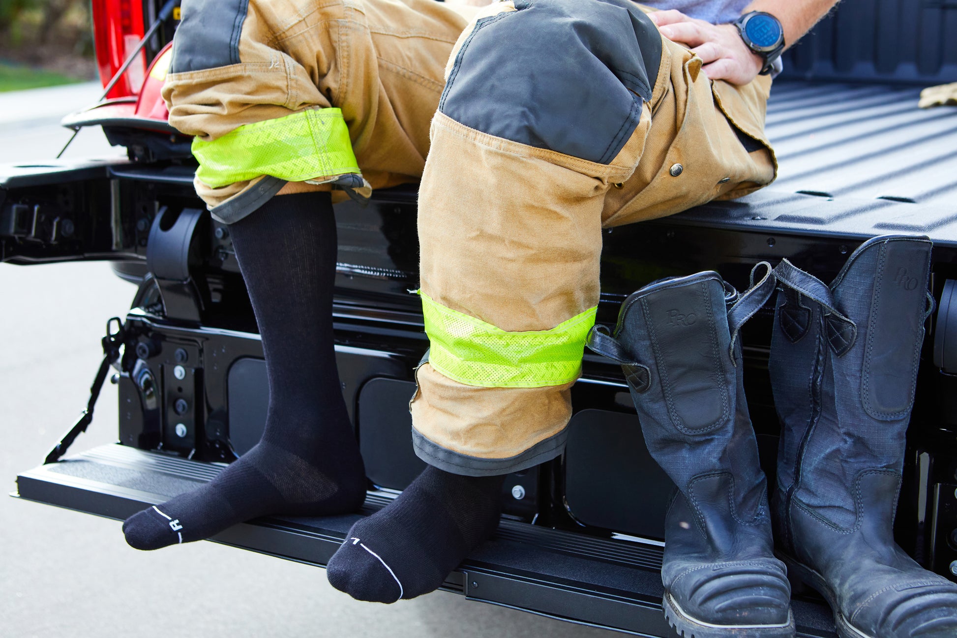 Firefighter in tactical boot ORP Socks.